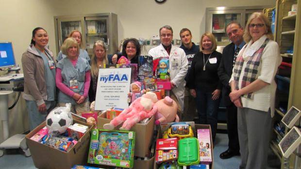 Pictured (left to right): Shanelle Farquharson, RN, Kathleen Pawloski, RN, Elena Bergami, NSC, Lisa Jones-Koliski, RN, Jeannie Thomas, NSC, Dr. Steven Sandoval, Ray Williams, Diane Williams, Ron Petrarca, and Denise Rueda.